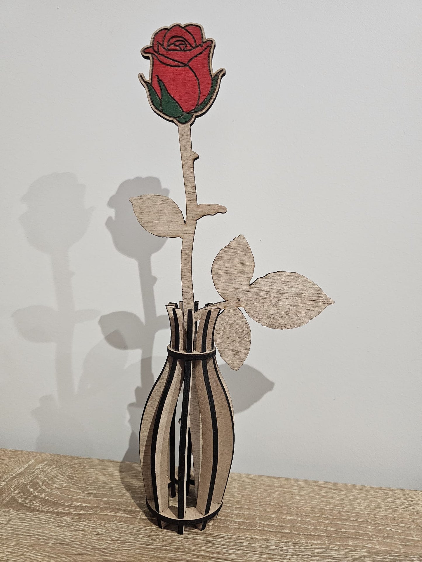 Rosa con vaso